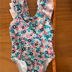 Ruffle Butts v back ruffle one piece swim suit